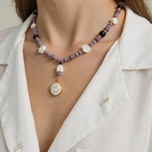 Lovely in lavender. lavender facet/Pearl/black/gold beaded necklace enhanced wit